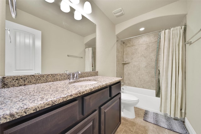 full bath featuring visible vents, toilet, shower / bath combo, vanity, and tile patterned floors