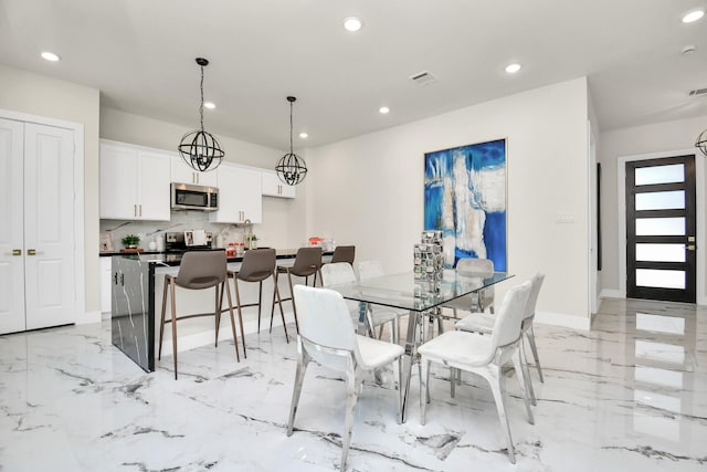 dining room with baseboards, marble finish floor, visible vents, and recessed lighting