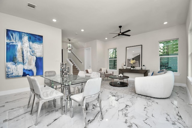 dining area with plenty of natural light, baseboards, visible vents, marble finish floor, and recessed lighting