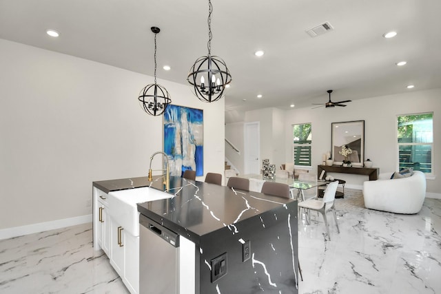 kitchen with recessed lighting, marble finish floor, visible vents, and dishwasher