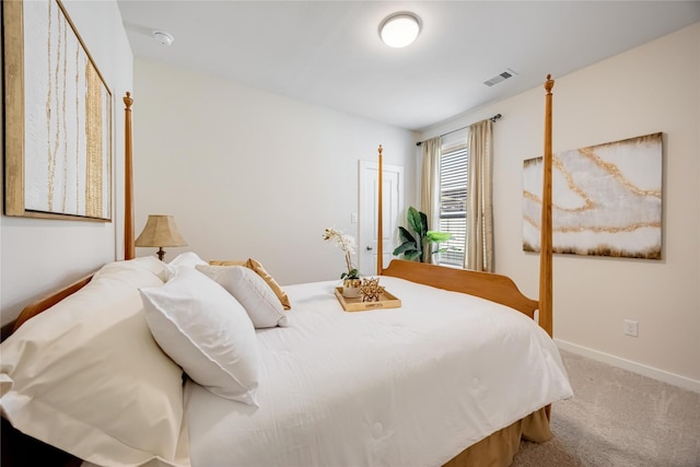 bedroom featuring carpet flooring, visible vents, and baseboards