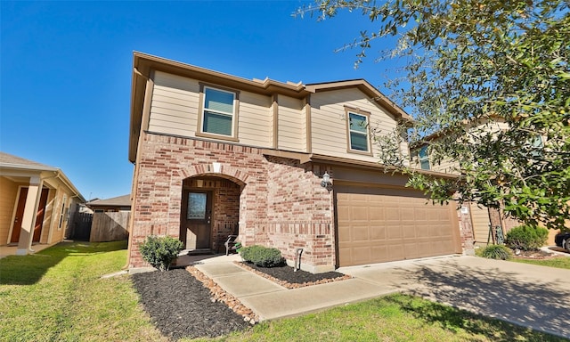 traditional home featuring a garage, brick siding, concrete driveway, fence, and a front yard