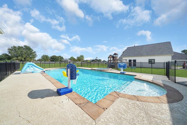 view of pool with a water slide, a fenced backyard, an in ground hot tub, a yard, and a fenced in pool