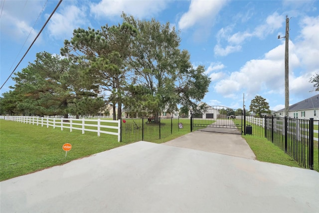 exterior space with a yard and fence