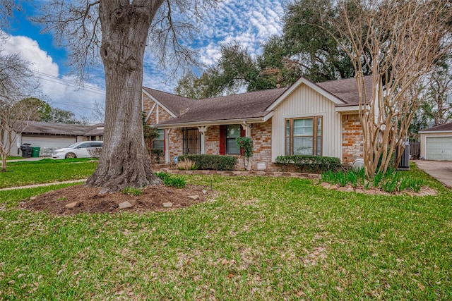 view of front of house with a garage, a front yard, brick siding, and a shingled roof