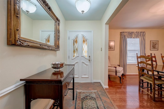 entrance foyer featuring baseboards