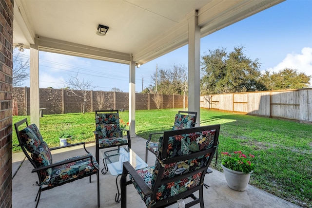 view of patio featuring a fenced backyard and an outdoor hangout area