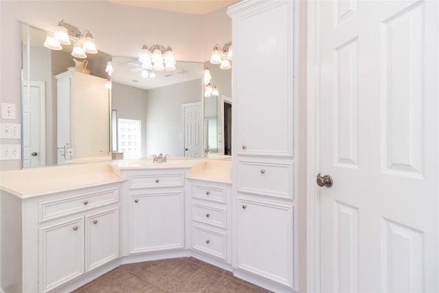 full bathroom with tile patterned flooring and vanity