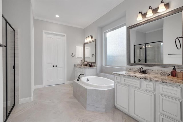 full bathroom featuring crown molding, a shower stall, vanity, baseboards, and a bath