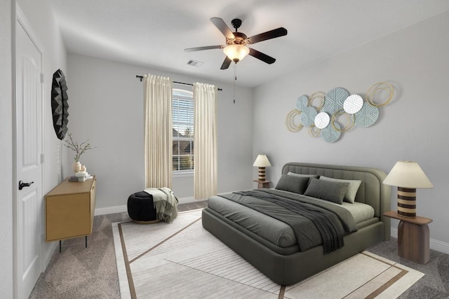 bedroom featuring a ceiling fan, carpet, visible vents, and baseboards