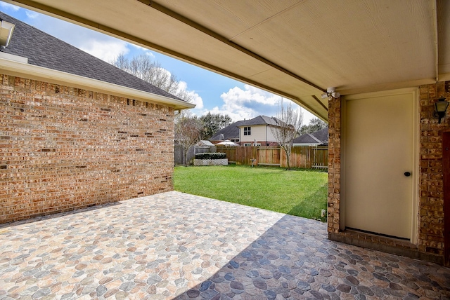 view of patio with fence