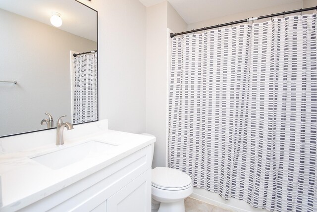 full bath with toilet, a shower with curtain, tile patterned flooring, and vanity