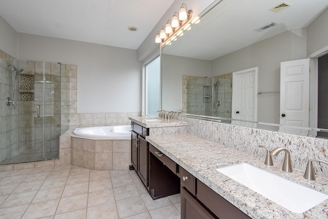 full bathroom with a stall shower, tile patterned flooring, visible vents, and a bath