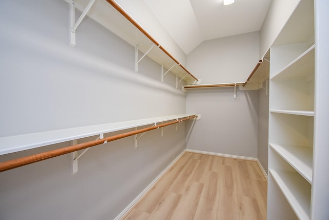 spacious closet with light wood-style floors