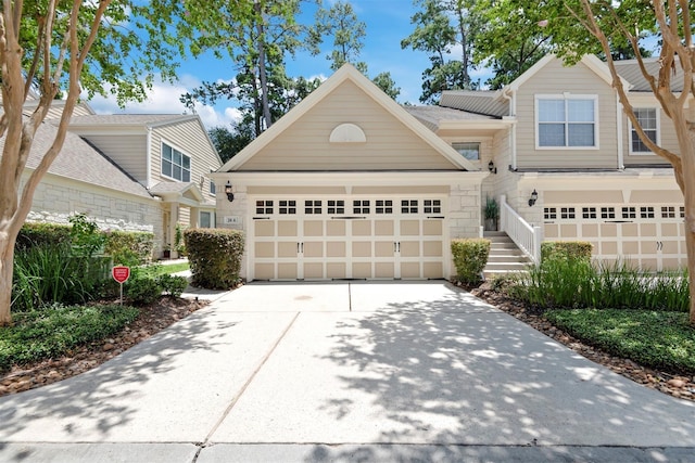 view of front facade featuring a garage and concrete driveway