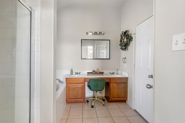 full bathroom with a stall shower, a sink, a bath, and tile patterned floors