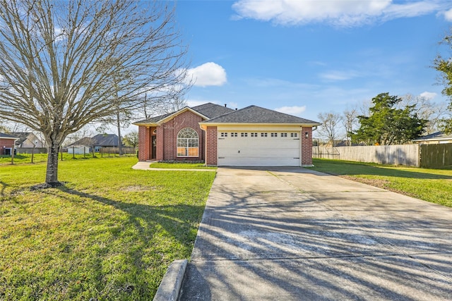 single story home featuring brick siding, concrete driveway, an attached garage, fence, and a front yard