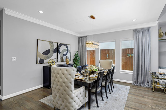 dining area featuring ornamental molding, recessed lighting, wood finished floors, and baseboards