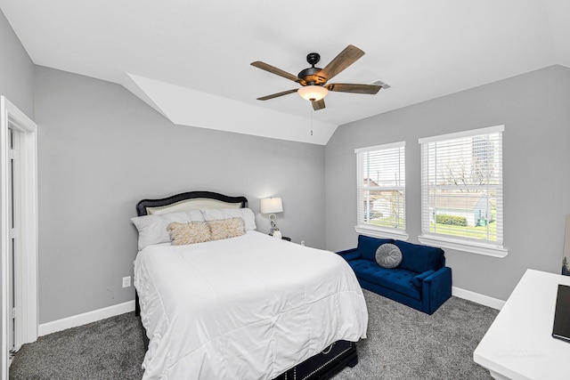 bedroom featuring lofted ceiling, baseboards, visible vents, and carpet flooring