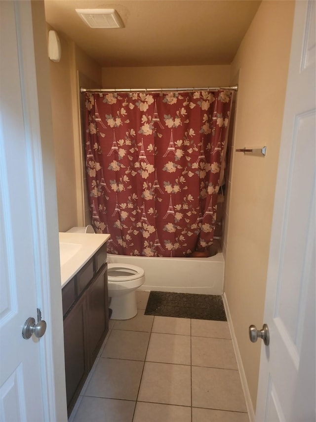 bathroom featuring toilet, vanity, visible vents, tile patterned floors, and shower / bathtub combination with curtain