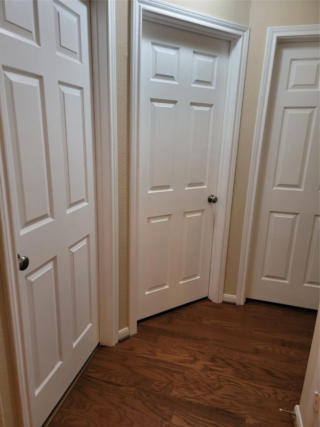 hall featuring dark wood-style floors