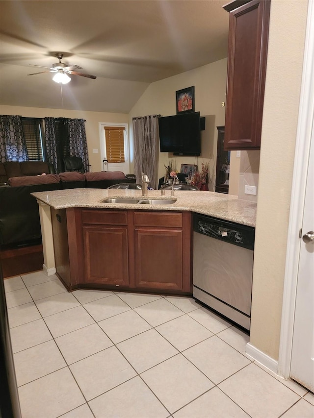 kitchen featuring light tile patterned floors, open floor plan, a peninsula, stainless steel dishwasher, and a sink