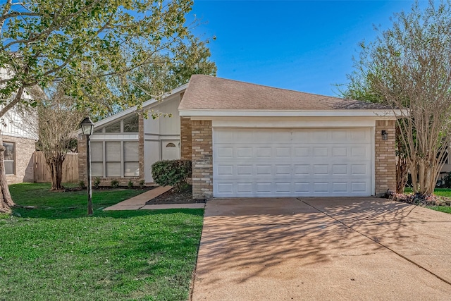 mid-century home featuring brick siding, driveway, and a front lawn