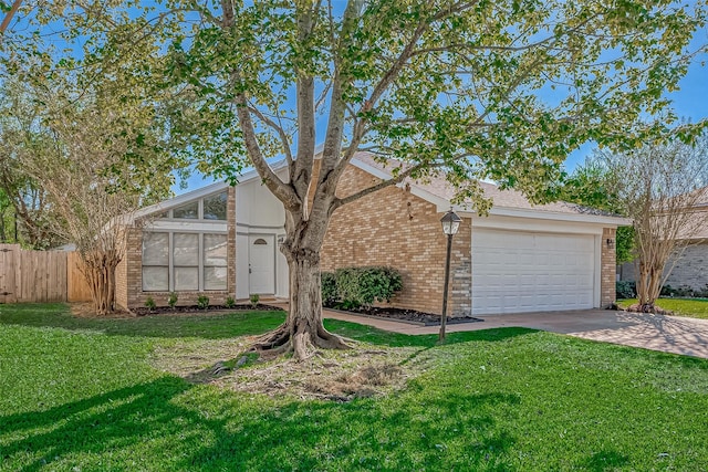 mid-century home with a garage, driveway, fence, a front yard, and brick siding