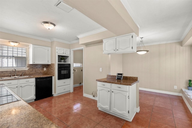 kitchen with visible vents, backsplash, white cabinetry, a sink, and black appliances