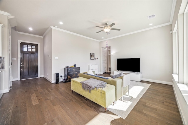 living room featuring visible vents, baseboards, ceiling fan, dark wood-type flooring, and crown molding