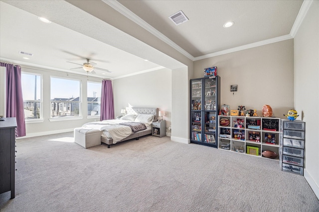 bedroom with carpet, visible vents, baseboards, and ornamental molding