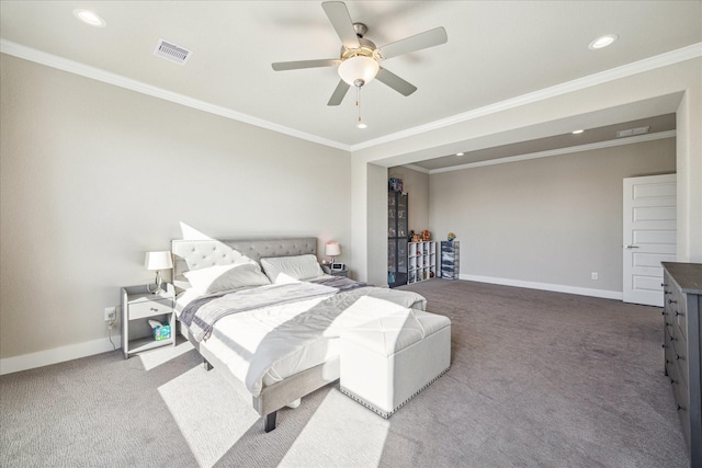 carpeted bedroom with baseboards, visible vents, crown molding, and recessed lighting