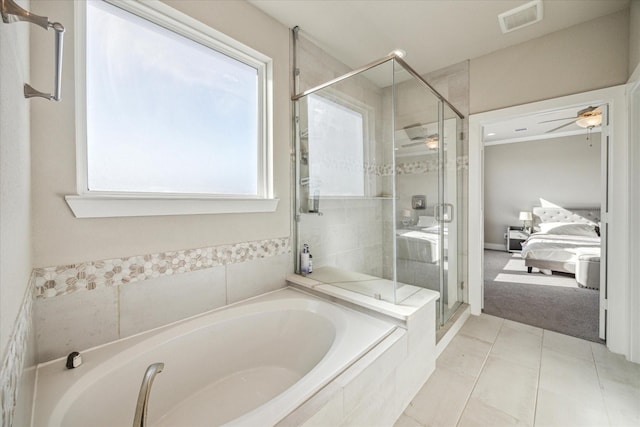 ensuite bathroom featuring visible vents, ceiling fan, ensuite bathroom, a garden tub, and a shower stall