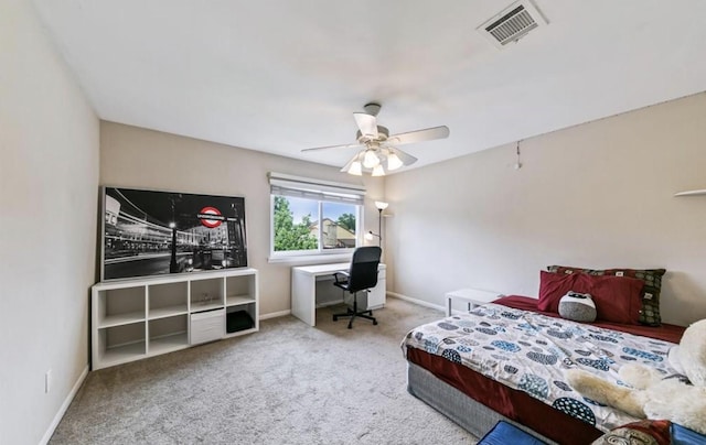 bedroom featuring carpet floors, a ceiling fan, visible vents, and baseboards