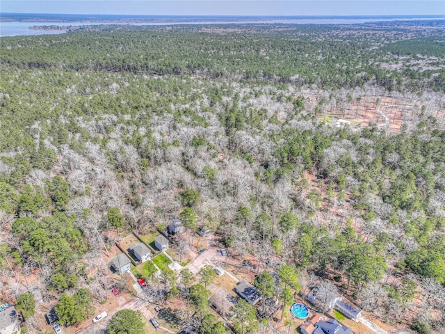 bird's eye view featuring a forest view