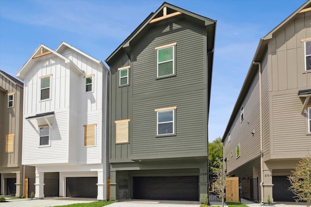 view of front of house with an attached garage and board and batten siding