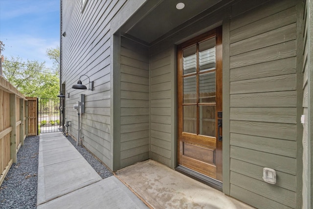 entrance to property with a gate and fence