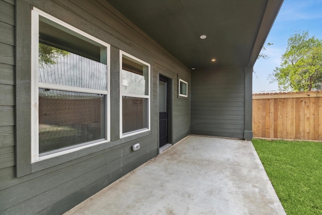 view of patio with fence