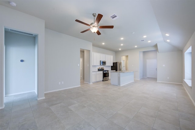 unfurnished living room with recessed lighting, visible vents, vaulted ceiling, ceiling fan, and baseboards