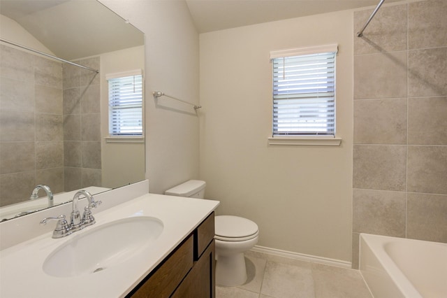 full bath with vanity, tile patterned flooring, toilet, and a healthy amount of sunlight