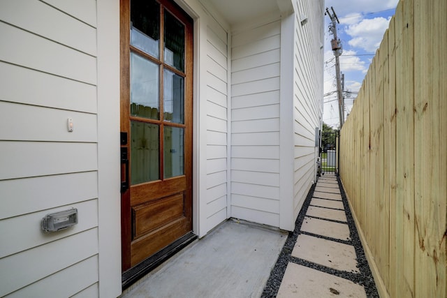 property entrance with fence