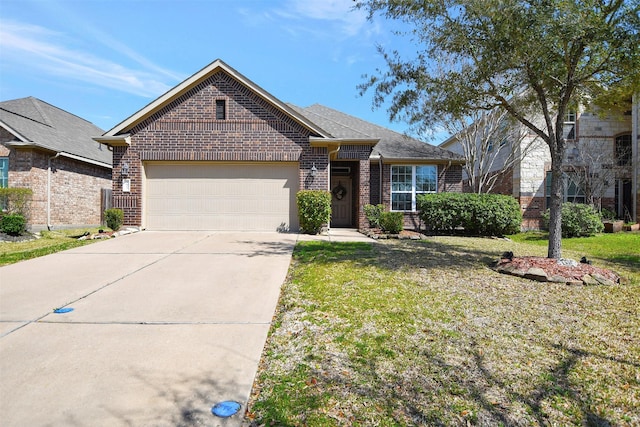 view of front of house with a garage, driveway, a front lawn, and brick siding