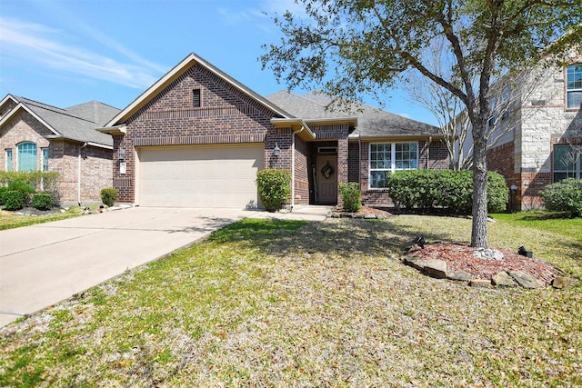 view of front of home with a garage, driveway, brick siding, and a front yard