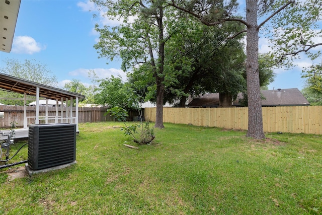 view of yard featuring cooling unit and a fenced backyard