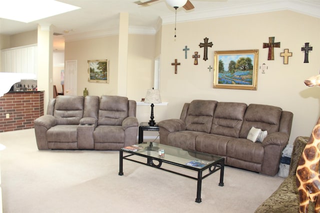 living area with carpet flooring, ceiling fan, and ornamental molding