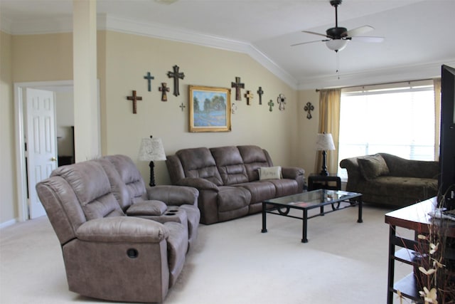 carpeted living room with ceiling fan, vaulted ceiling, and ornamental molding