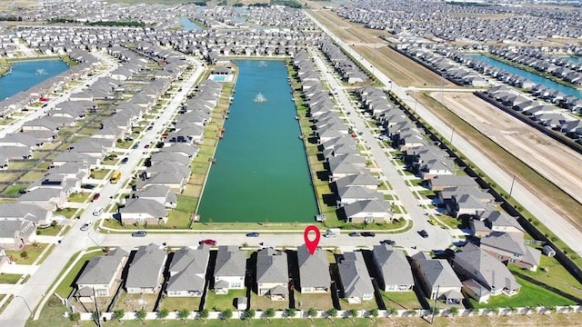 aerial view with a water view and a residential view