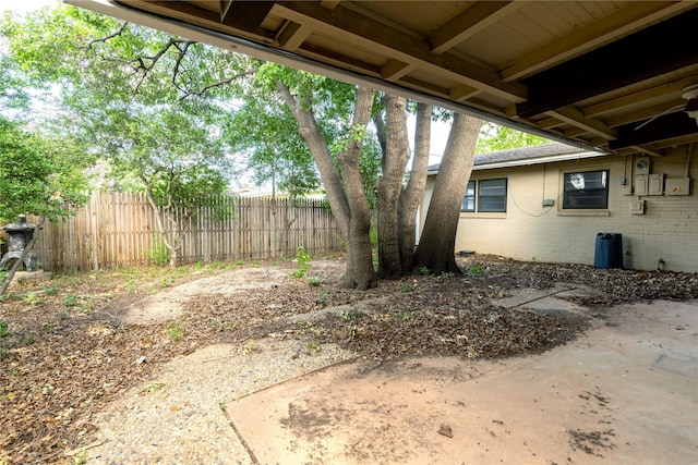 view of yard featuring fence