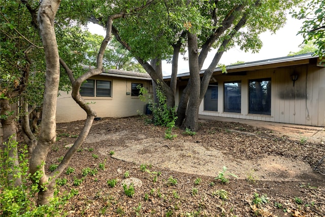 back of property with brick siding