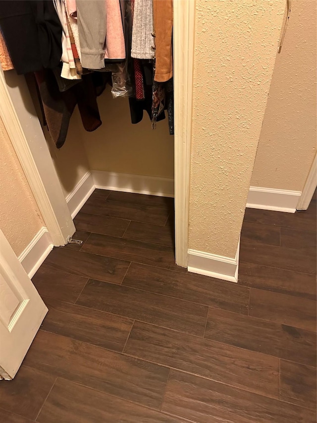 spacious closet with wood finished floors